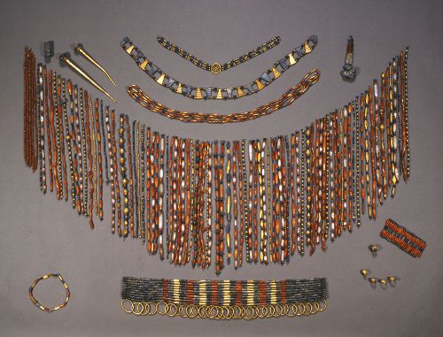 Beaded cape and regalia from ancient Ur. Multi-colored precious stones and gold. Ahuna vairya.