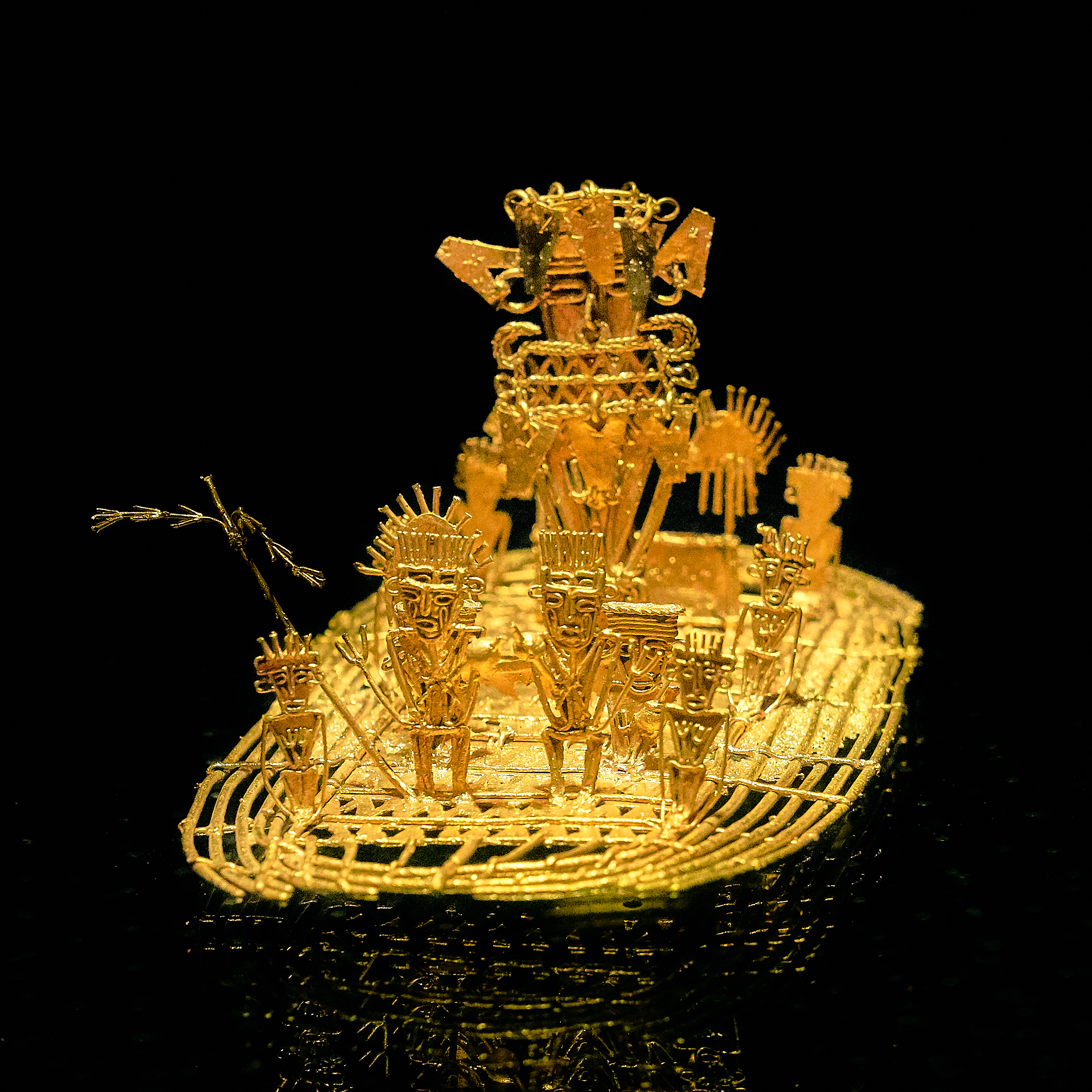 Gold raft with voyagers from ancient Muisca Confederation. Guatavita goddess presiding. Humanities.